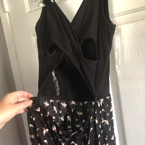 Black jumpsuit with little birds on legs